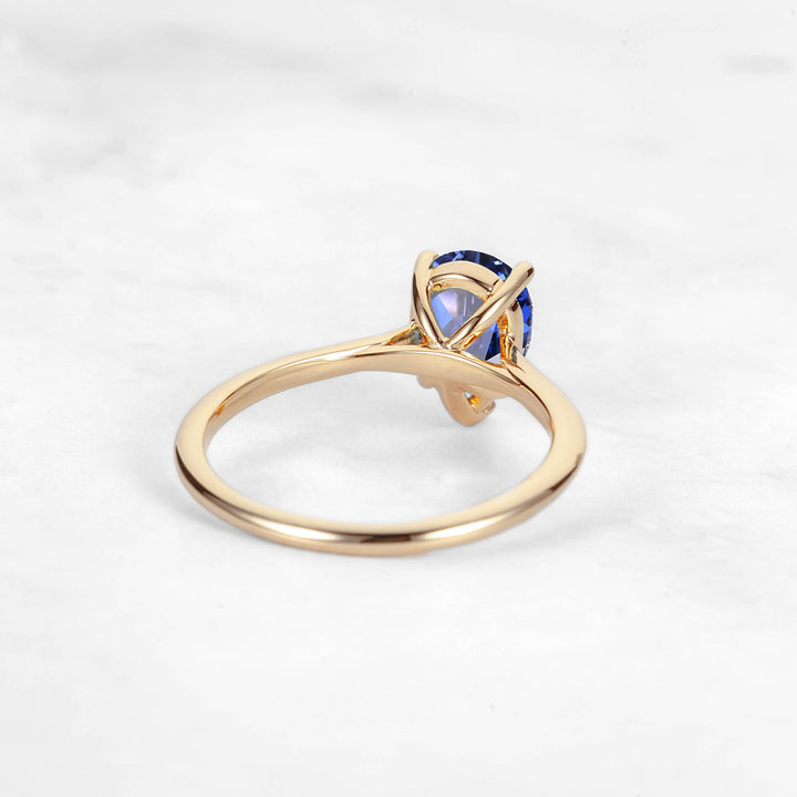 Pretti Pear Blue Sapphire Engagement Ring