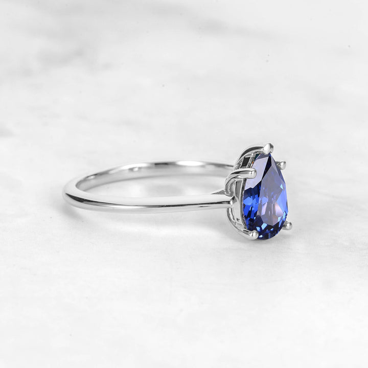 Pretti Pear Blue Sapphire Engagement Ring