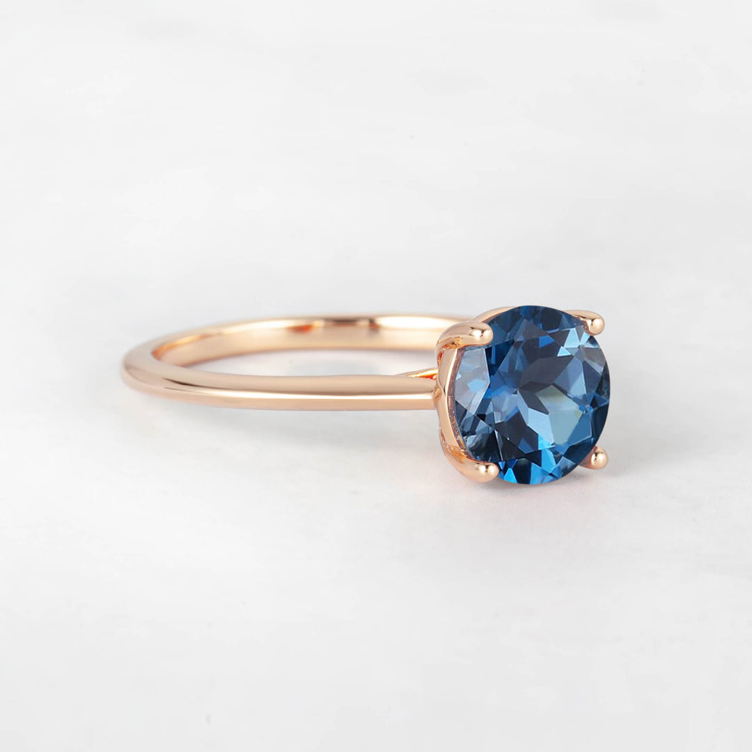 Pretti Round Blue Topaz Engagement Ring