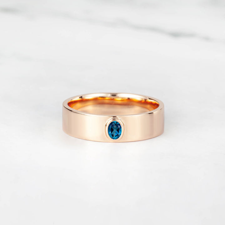 Satra Oval Blue Topaz Engagement Ring