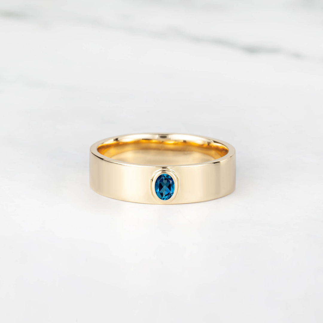 Satra Oval Blue Topaz Engagement Ring