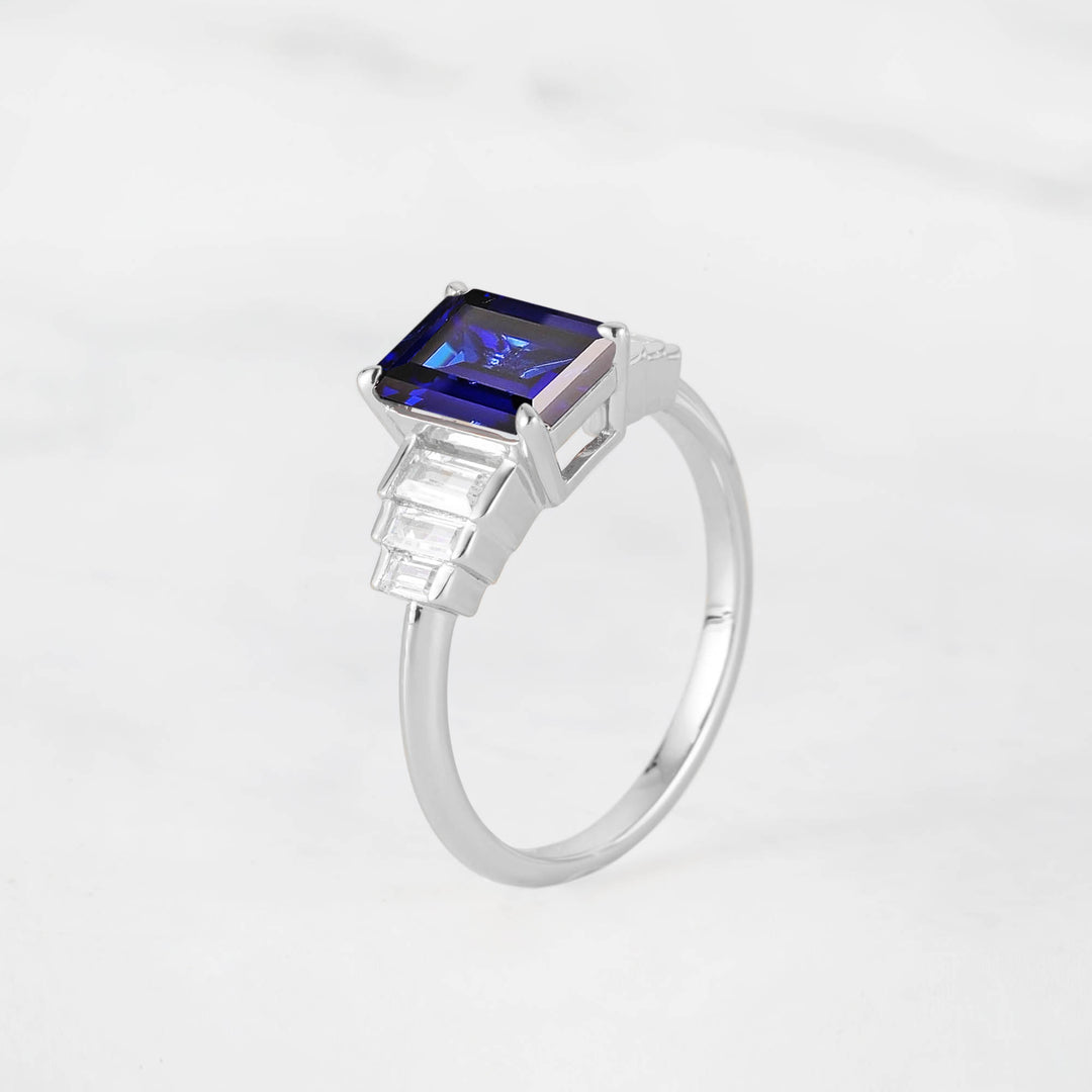 Symmar Emearld-Cut Blue Sapphire Baguette Diamond Engagement Ring